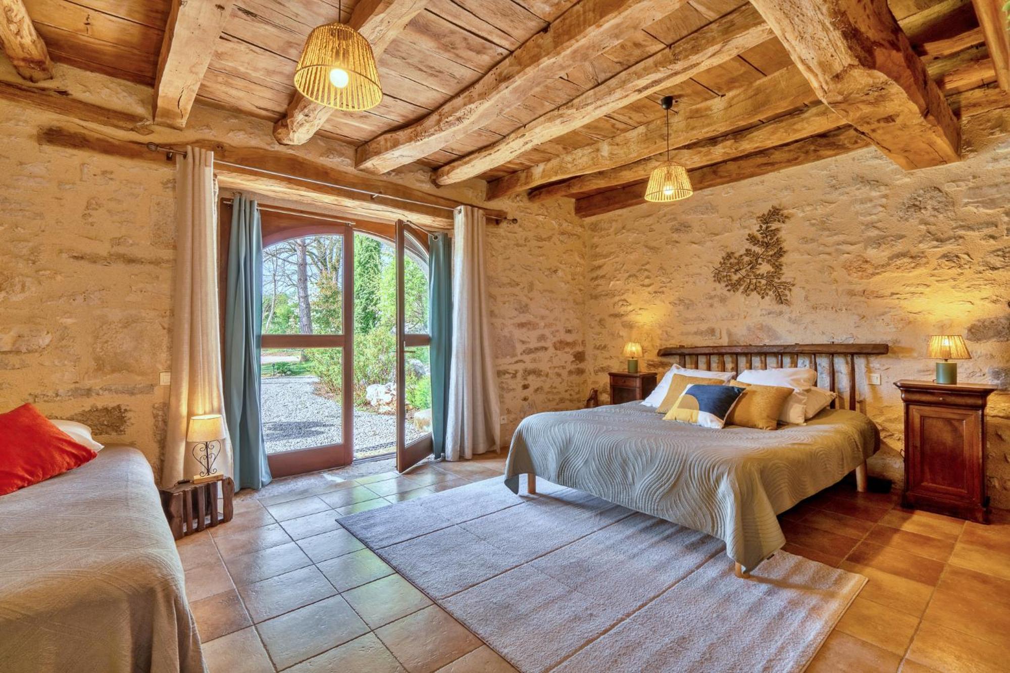 Chambres Et Jardin De Pierres Espédaillac Esterno foto