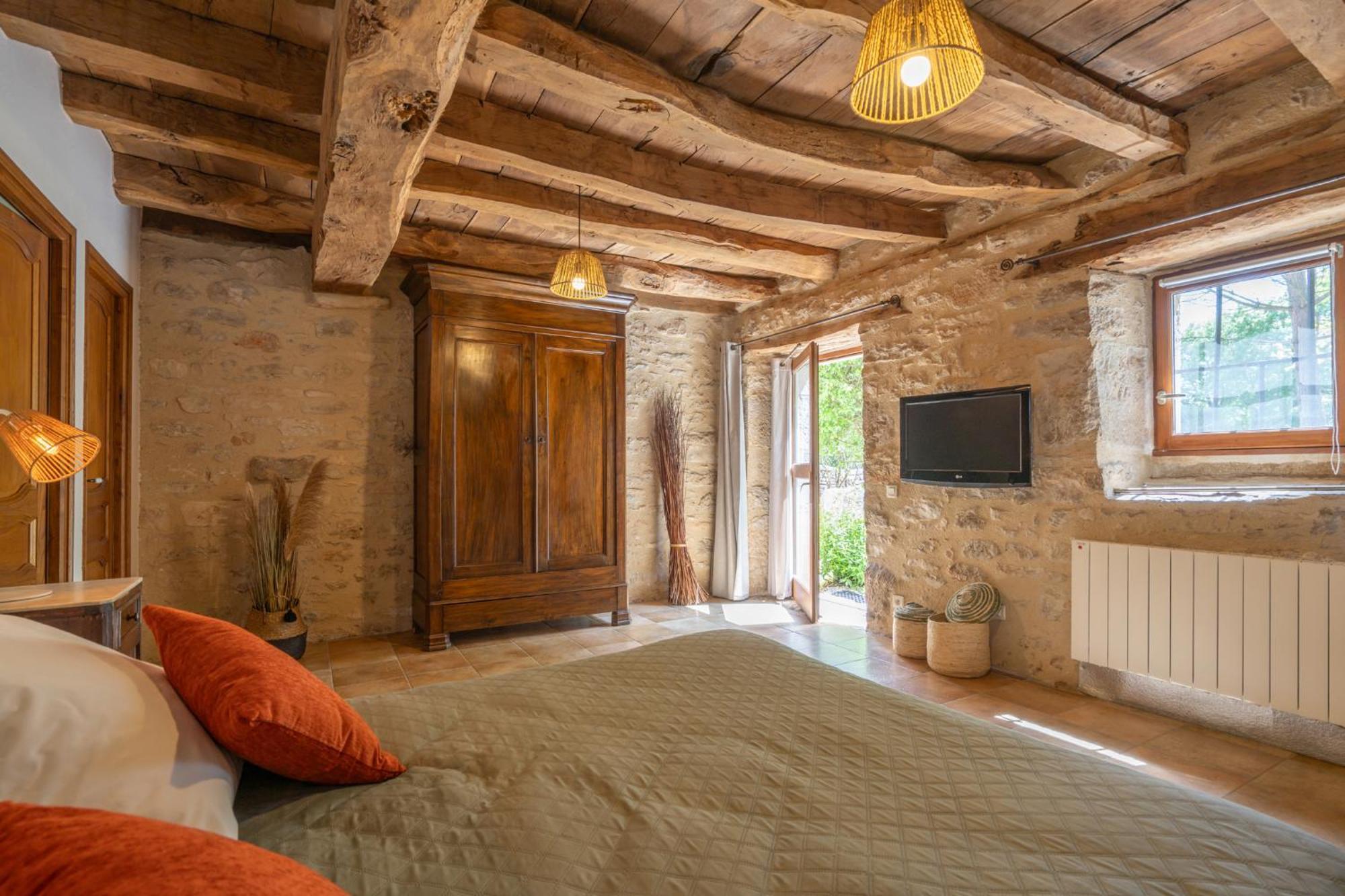 Chambres Et Jardin De Pierres Espédaillac Esterno foto